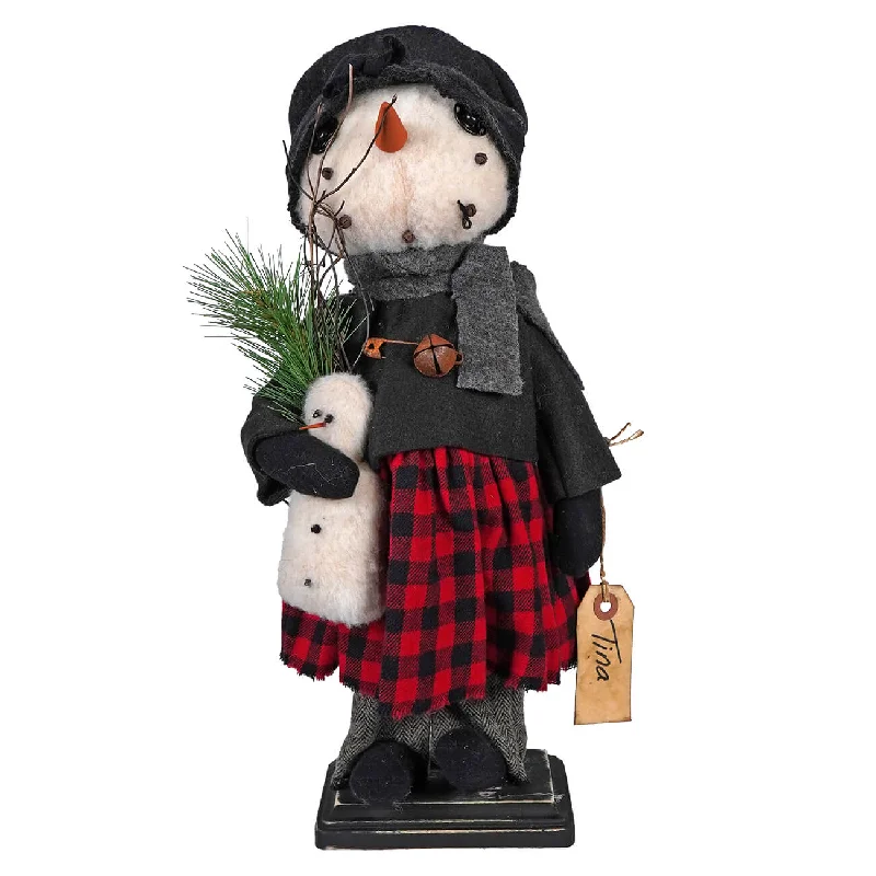 Tina Snowgirl Wearing Red Plaid Dress & Holding Snowman Doll